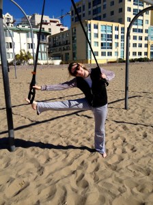 Using the MostFit Suspension Strap to stretch, as if it were a ballet barre